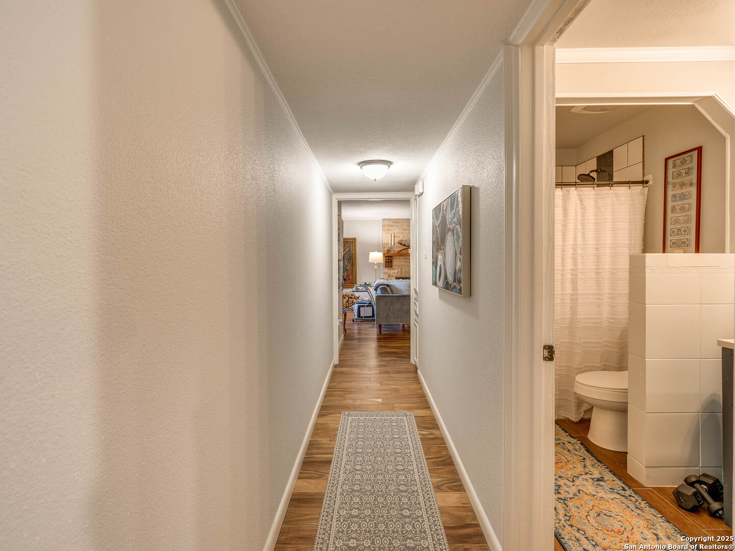 7711 Callaghan Road, Unit 702 San Antonio, TX 78229 - Photo 11 of 49 a view of a bathroom from the hallway
