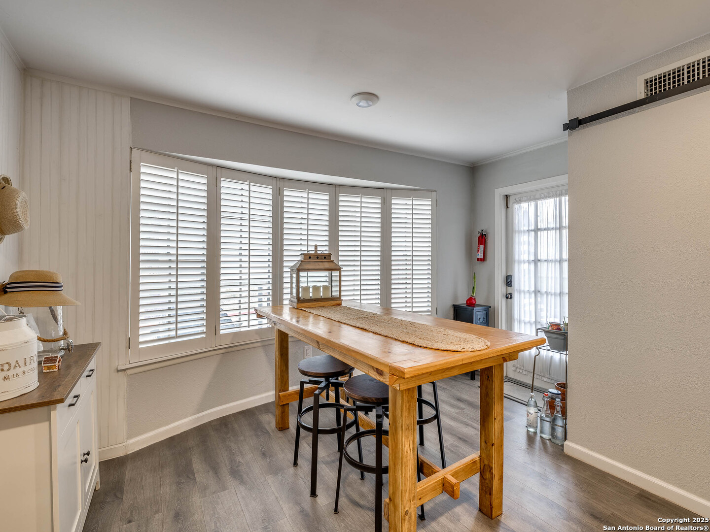 7711 Callaghan Road, Unit 702 San Antonio, TX 78229 - Photo 22 of 49 a dining room with furniture and window