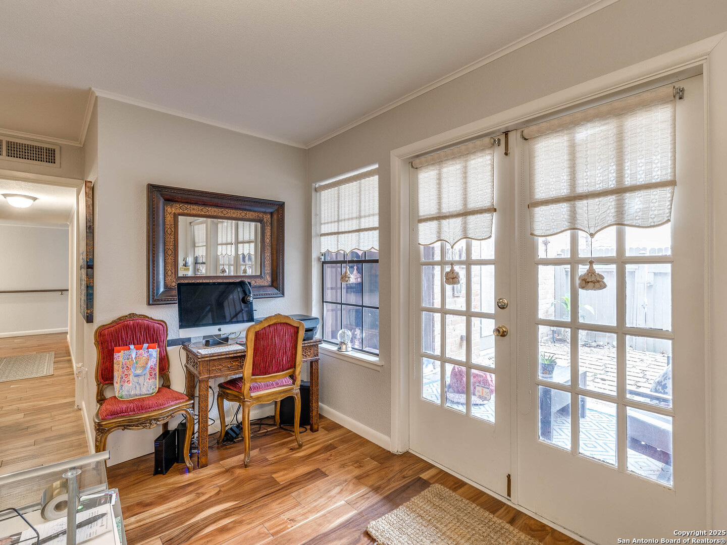 7711 Callaghan Road, Unit 702 San Antonio, TX 78229 - Photo 32 of 49 a living room with furniture and a window