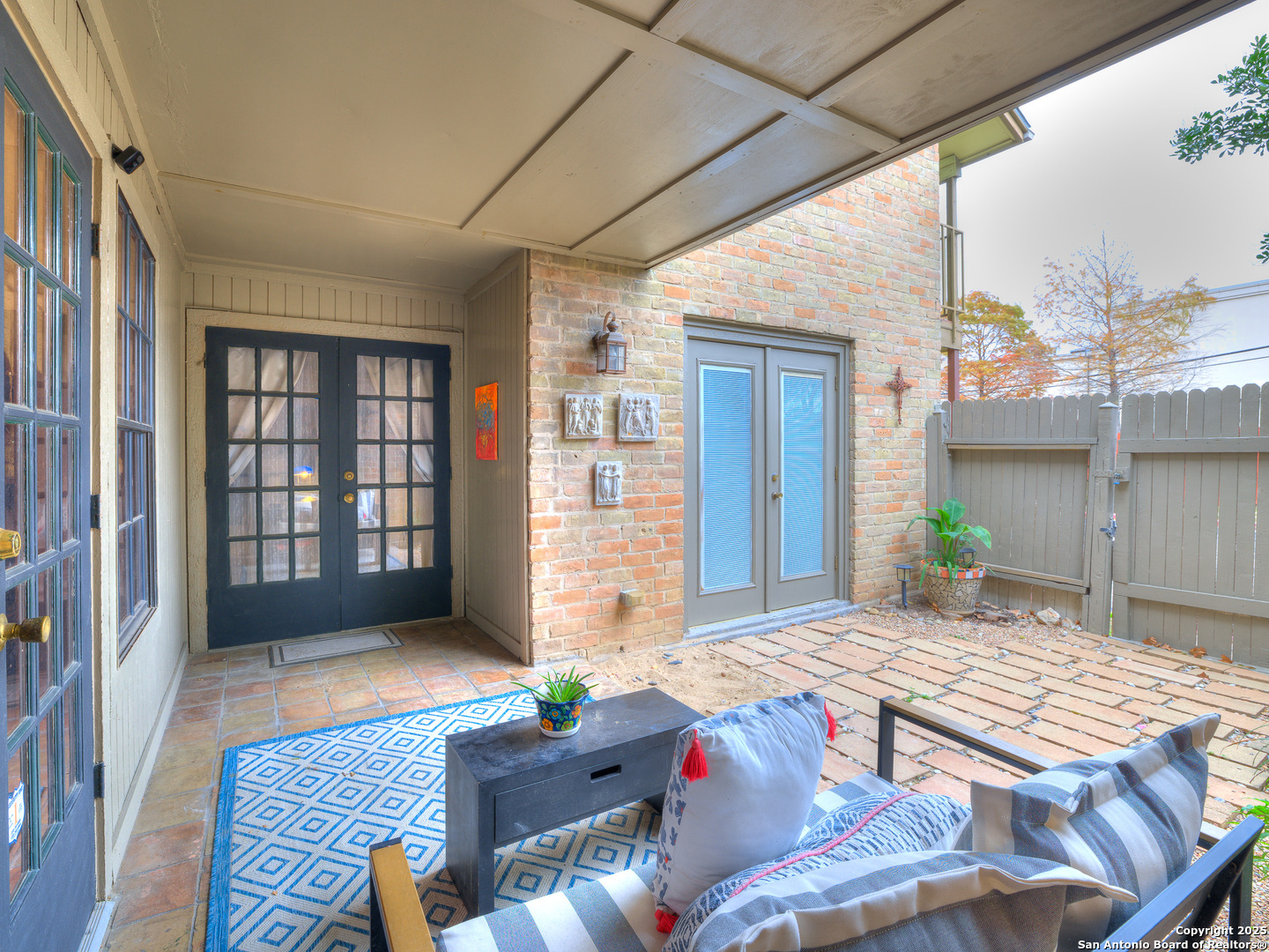 7711 Callaghan Road, Unit 702 San Antonio, TX 78229 - Photo 45 of 49 a living room with furniture rug and a window