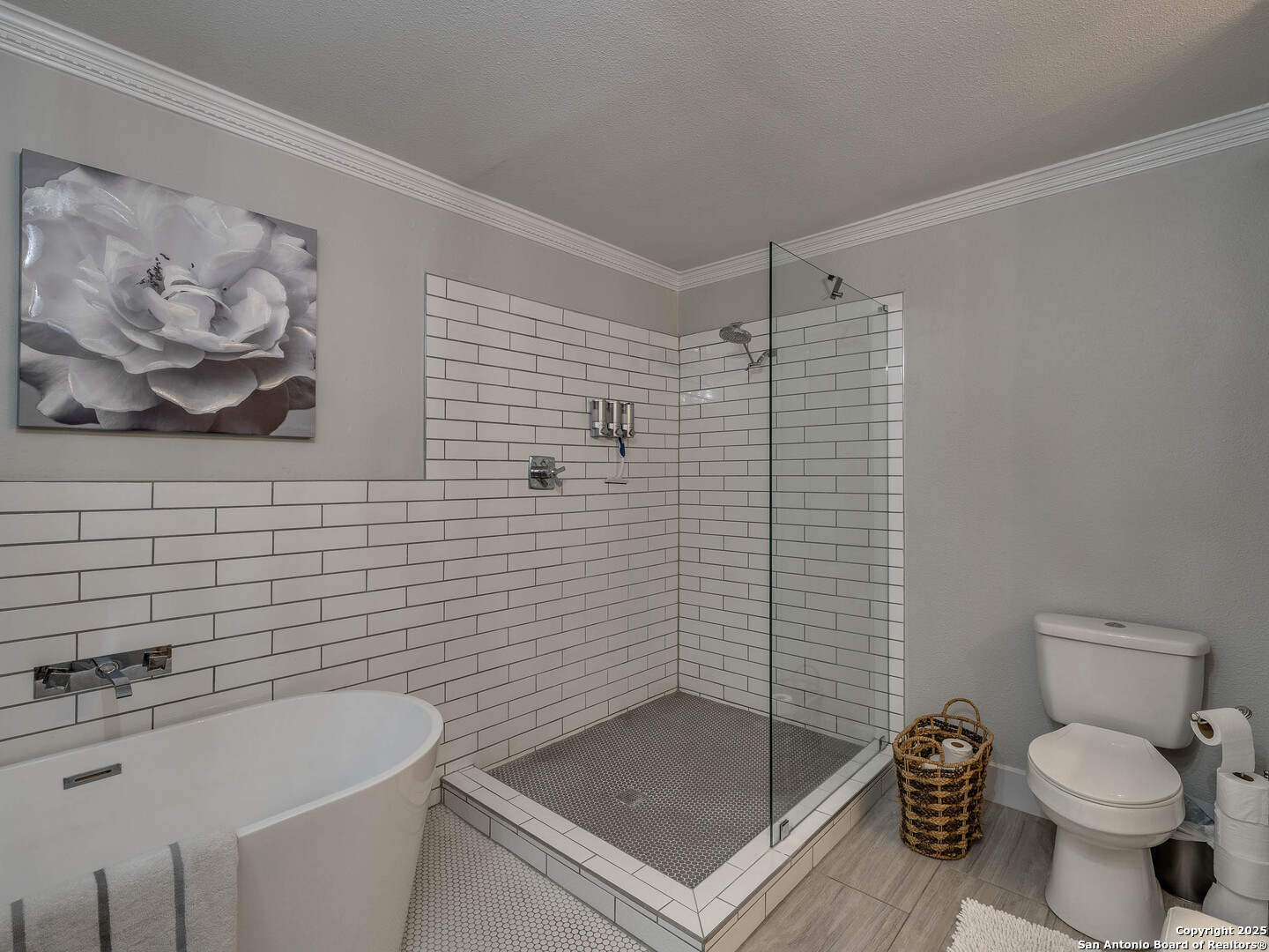 7711 Callaghan Road, Unit 702 San Antonio, TX 78229 - Photo 6 of 49 a bathroom with a sink toilet and shower