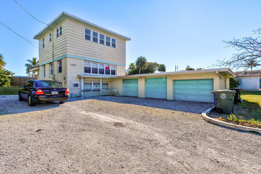 1140 Hernando Street Fort Pierce, FL 34949 - Photo 1 of 37 a view of a street with cars