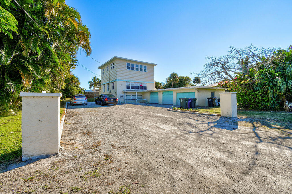 1140 Hernando Street Fort Pierce, FL 34949 - Photo 5 of 37 a view of a street with cars on road