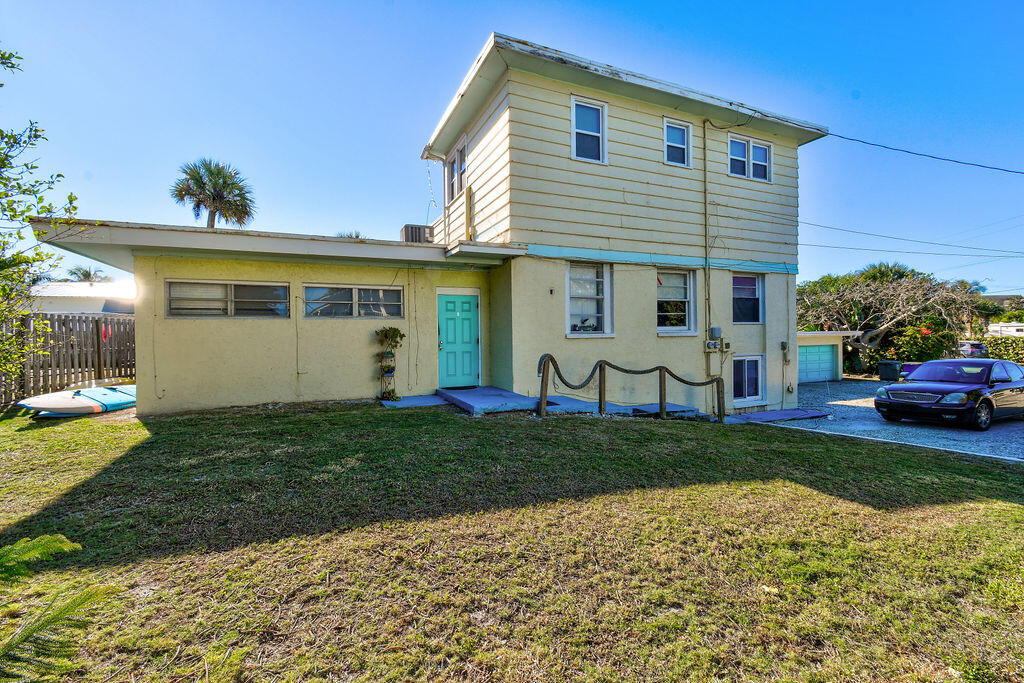 1140 Hernando Street Fort Pierce, FL 34949 - Photo 6 of 37 a view of a house with backyard and sitting area