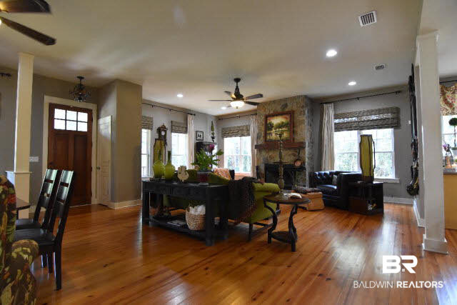 13848 Elmwood Court Stapleton, AL 36578 - Photo 2 of 27 Beautiful natural light flows throughout this lovely Coastal Cottage with Craftsman Flair. Enough open space to handle a large gathering.