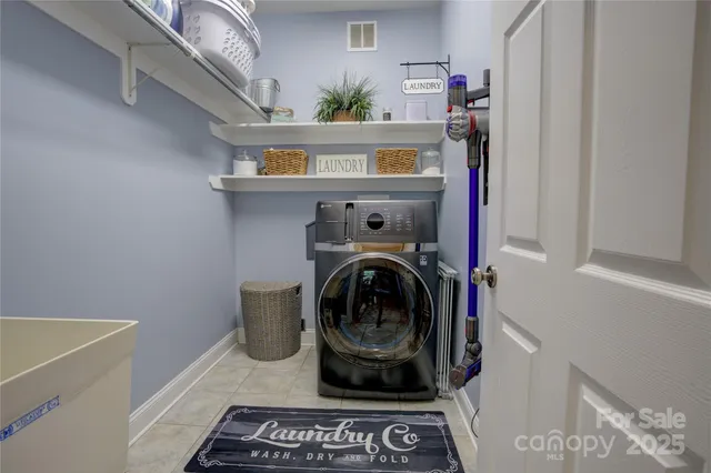 a bathroom with a toilet a sink and a mirror