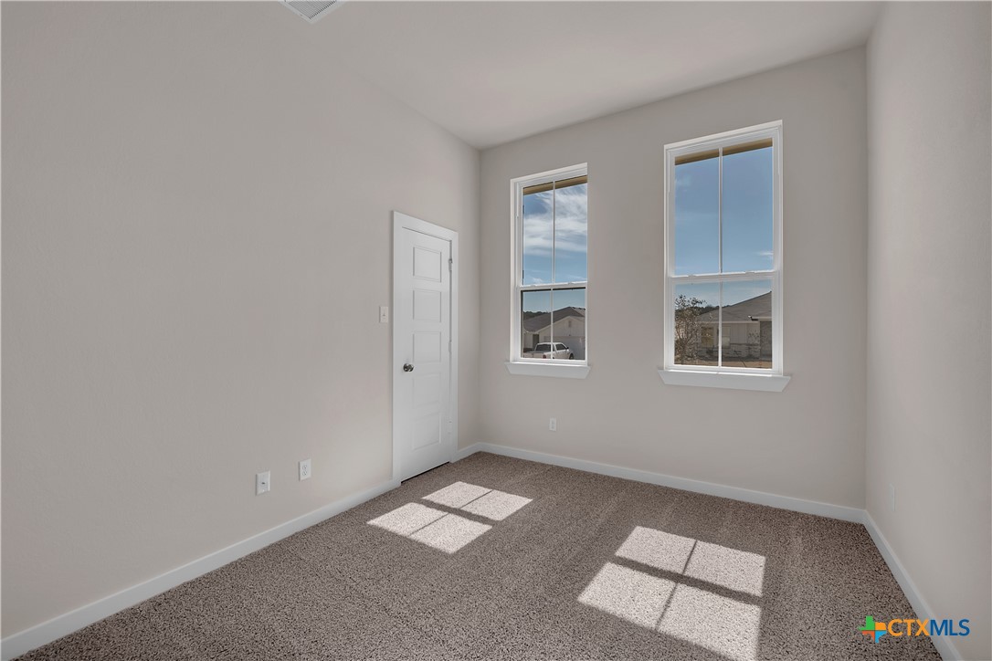 262 Wind Ridge Drive Copperas Cove, TX 76522 - Photo 3 of 30 an empty room with windows