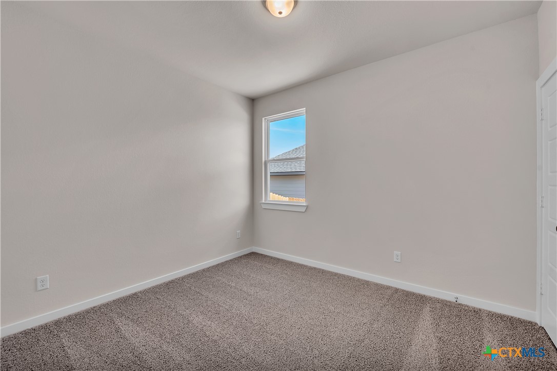 262 Wind Ridge Drive Copperas Cove, TX 76522 - Photo 6 of 30 a view of an empty room with a window