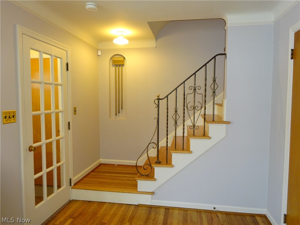 2927 Weymouth Road Cleveland, OH 44120 - Photo 2 of 29 Beautifully refinished red oak floors greet you immediately. Pretty wrought iron bannister leads to the second floor.