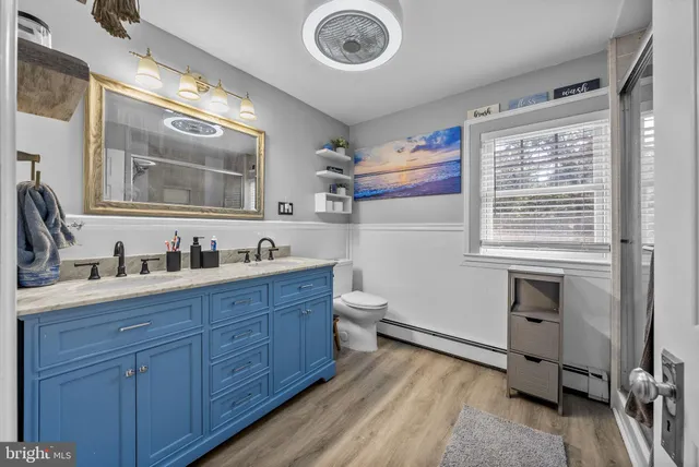 a view of swimming pool with seating space