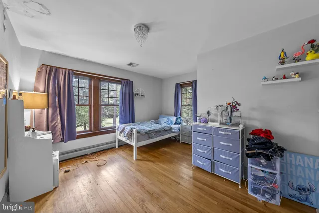 a swimming pool with outdoor seating and yard