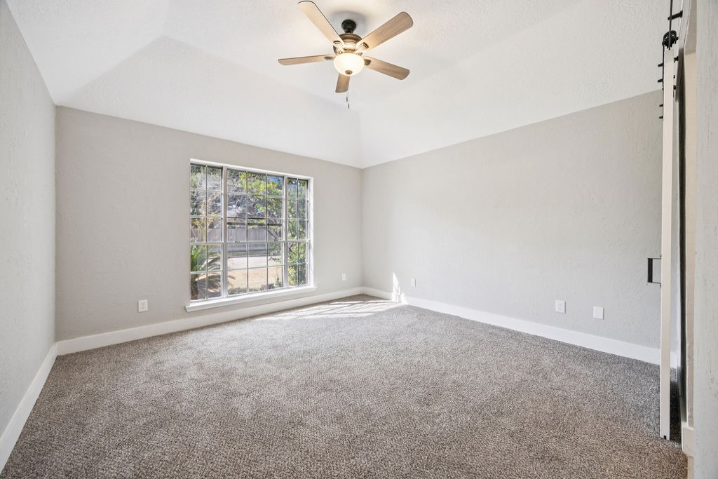 2942 Waterloo Road Pearland, TX 77581 - Photo 13 of 22 a view of an empty room with a window