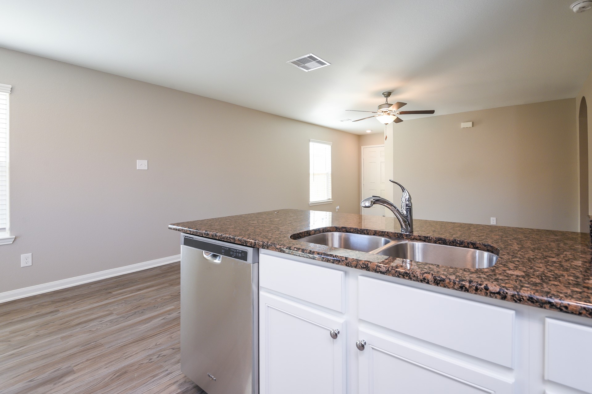 28041 Irving Drive Magnolia, TX 77355 - Photo 5 of 16 a kitchen with a sink and a stove