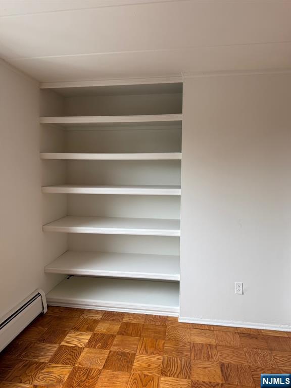 77 Prospect Avenue, Unit 6H Hackensack, NJ 07601 - Photo 7 of 15 a view of walk in closet with empty racks