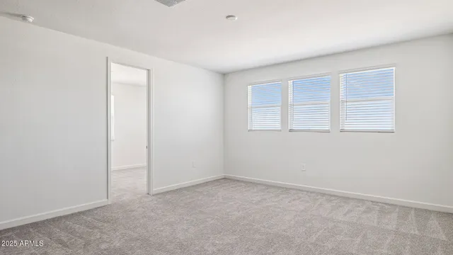a bathroom with a shower and a sink