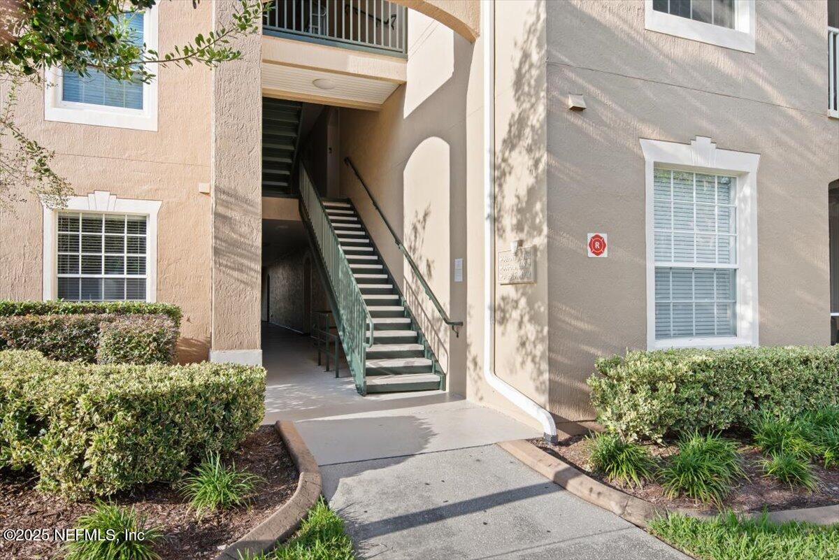 7990 Baymeadows Road East, Unit 913 Jacksonville, FL 32256 - Photo 1 of 70 a view of a entrance of the house