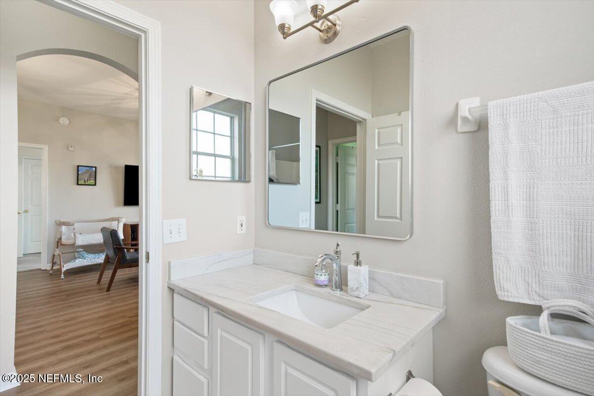 7990 Baymeadows Road East, Unit 913 Jacksonville, FL 32256 - Photo 37 of 70 a bathroom with a sink and a mirror
