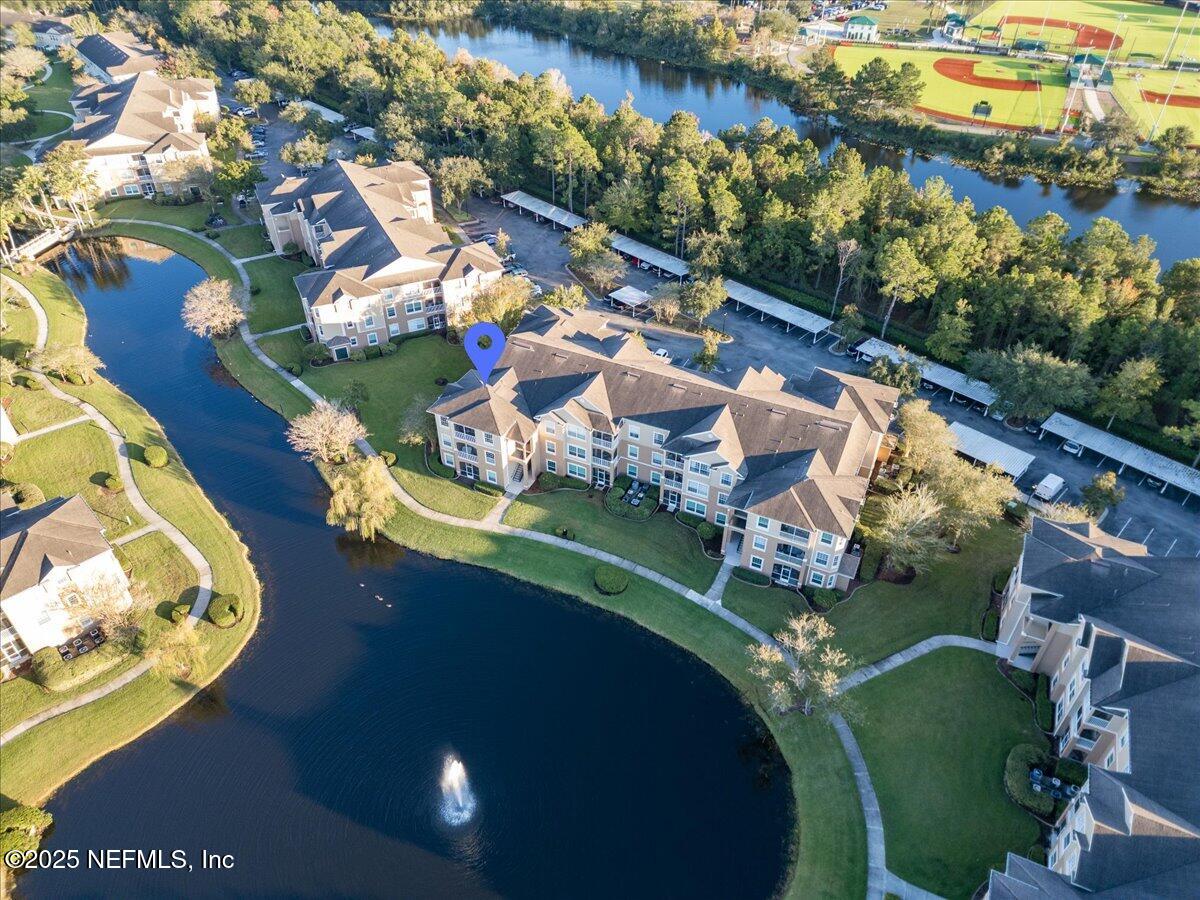 7990 Baymeadows Road East, Unit 913 Jacksonville, FL 32256 - Photo 51 of 70 an aerial view of a house with a lake view