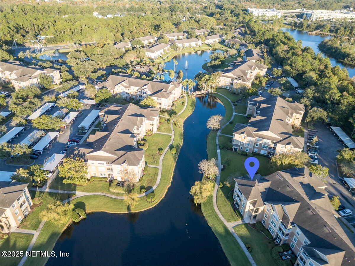 7990 Baymeadows Road East, Unit 913 Jacksonville, FL 32256 - Photo 53 of 70 an aerial view of residential houses with outdoor space
