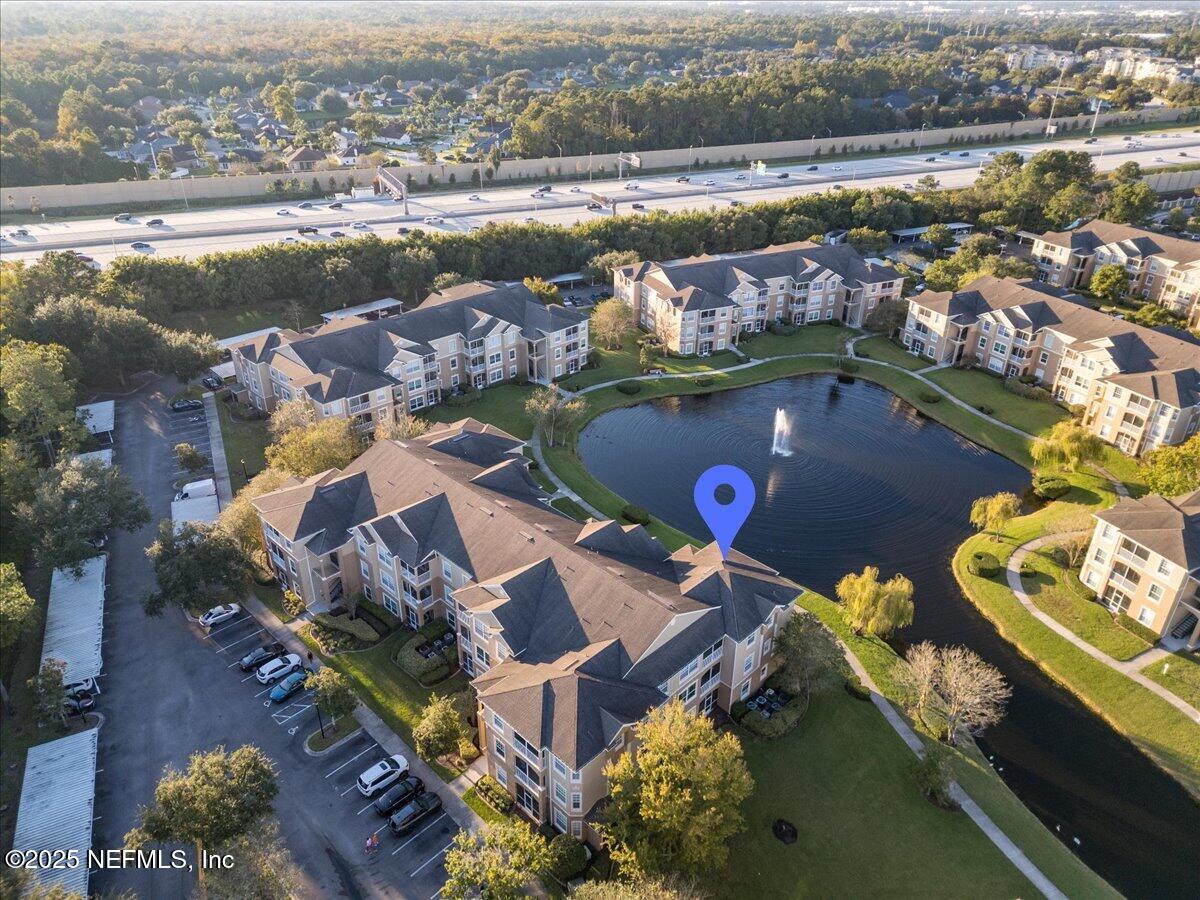 7990 Baymeadows Road East, Unit 913 Jacksonville, FL 32256 - Photo 58 of 70 an aerial view of residential houses with outdoor space