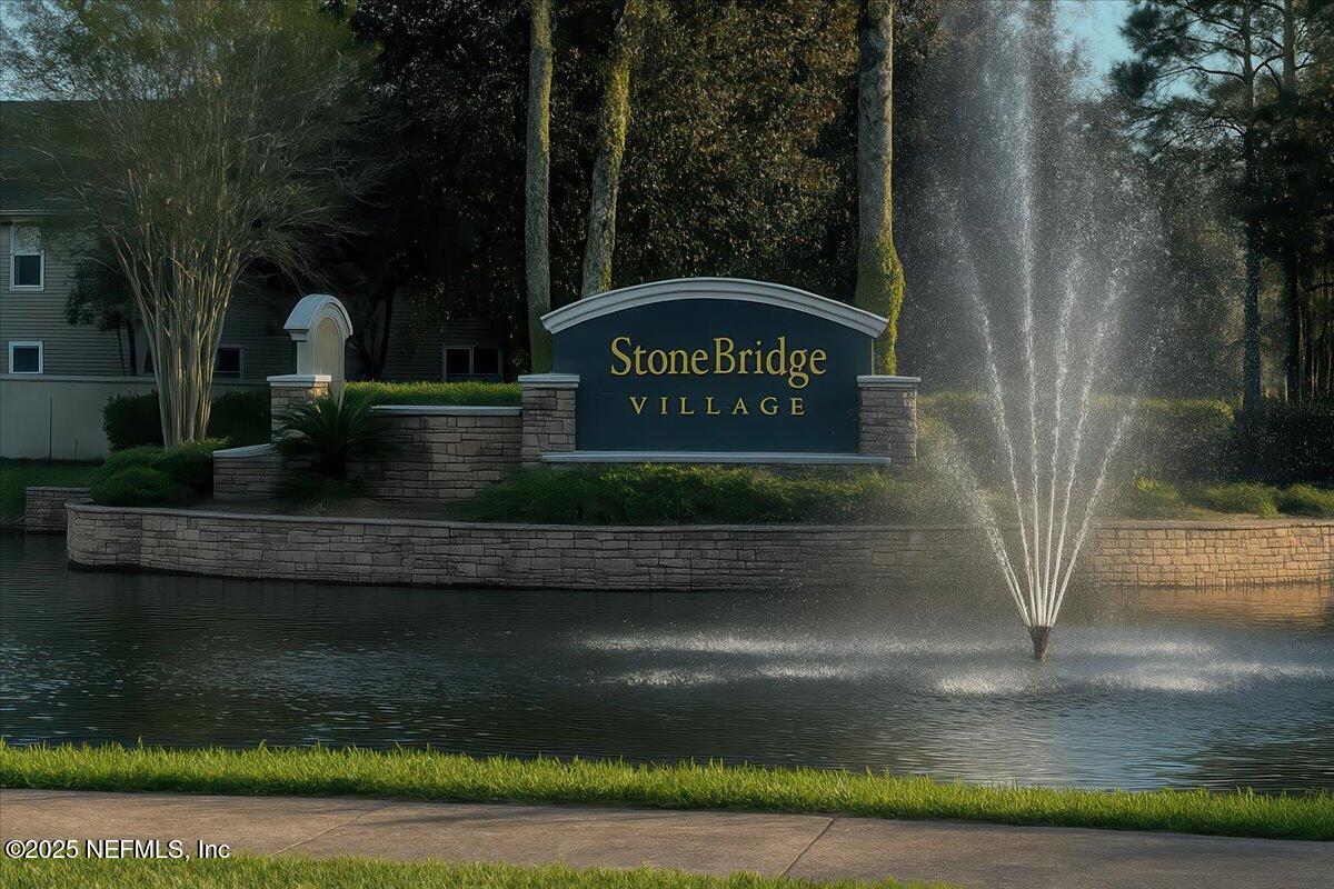 7990 Baymeadows Road East, Unit 913 Jacksonville, FL 32256 - Photo 66 of 70 a front view of a house with a yard