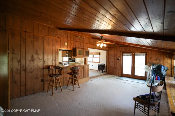 a view of a room with furniture window and entryway