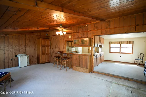 a view of a room with furniture