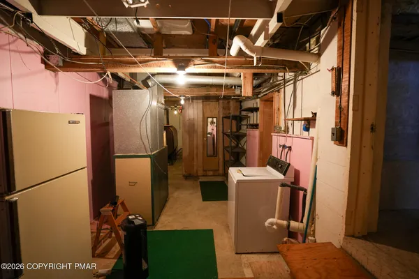 a view of a refrigerator with an empty shelves