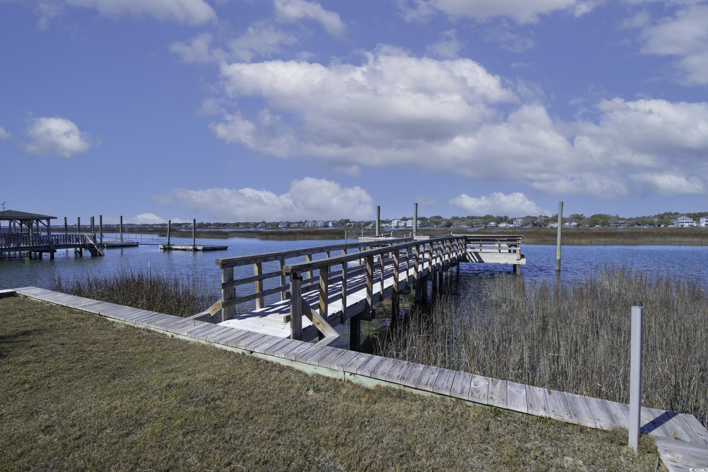 342 State Rd S-26-530 Murrells Inlet, SC 29576 - Photo 15 of 38 View of dock featuring a water view