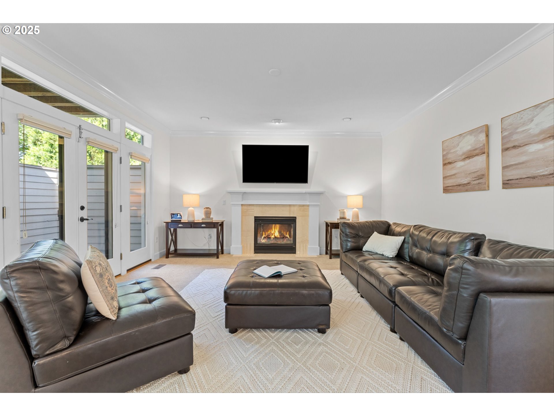 2711 Northwest 28th Circle Camas, WA 98607 - Photo 15 of 45 a living room with furniture a flat screen tv and a fireplace