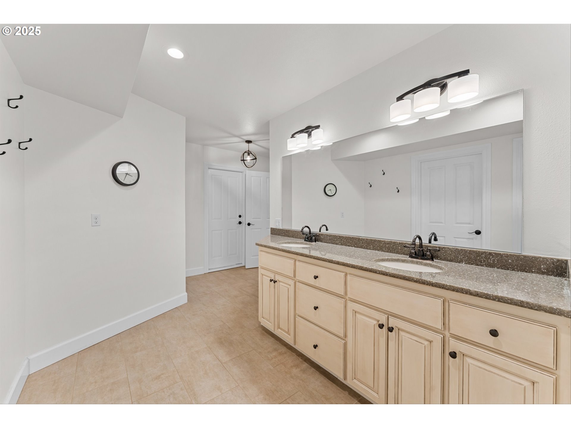 2711 Northwest 28th Circle Camas, WA 98607 - Photo 36 of 45 a bathroom with a granite countertop sink mirror and double