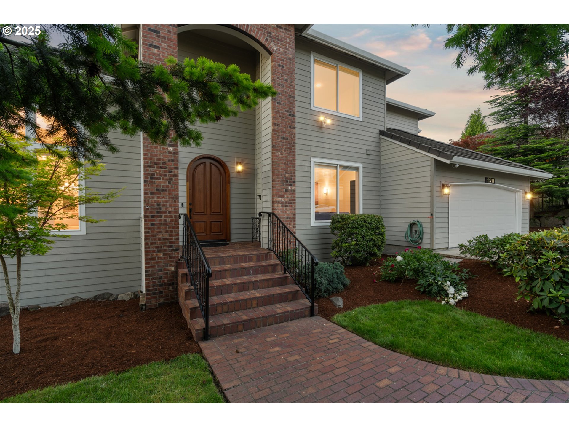 2711 Northwest 28th Circle Camas, WA 98607 - Photo 42 of 45 a front view of a house with a garden