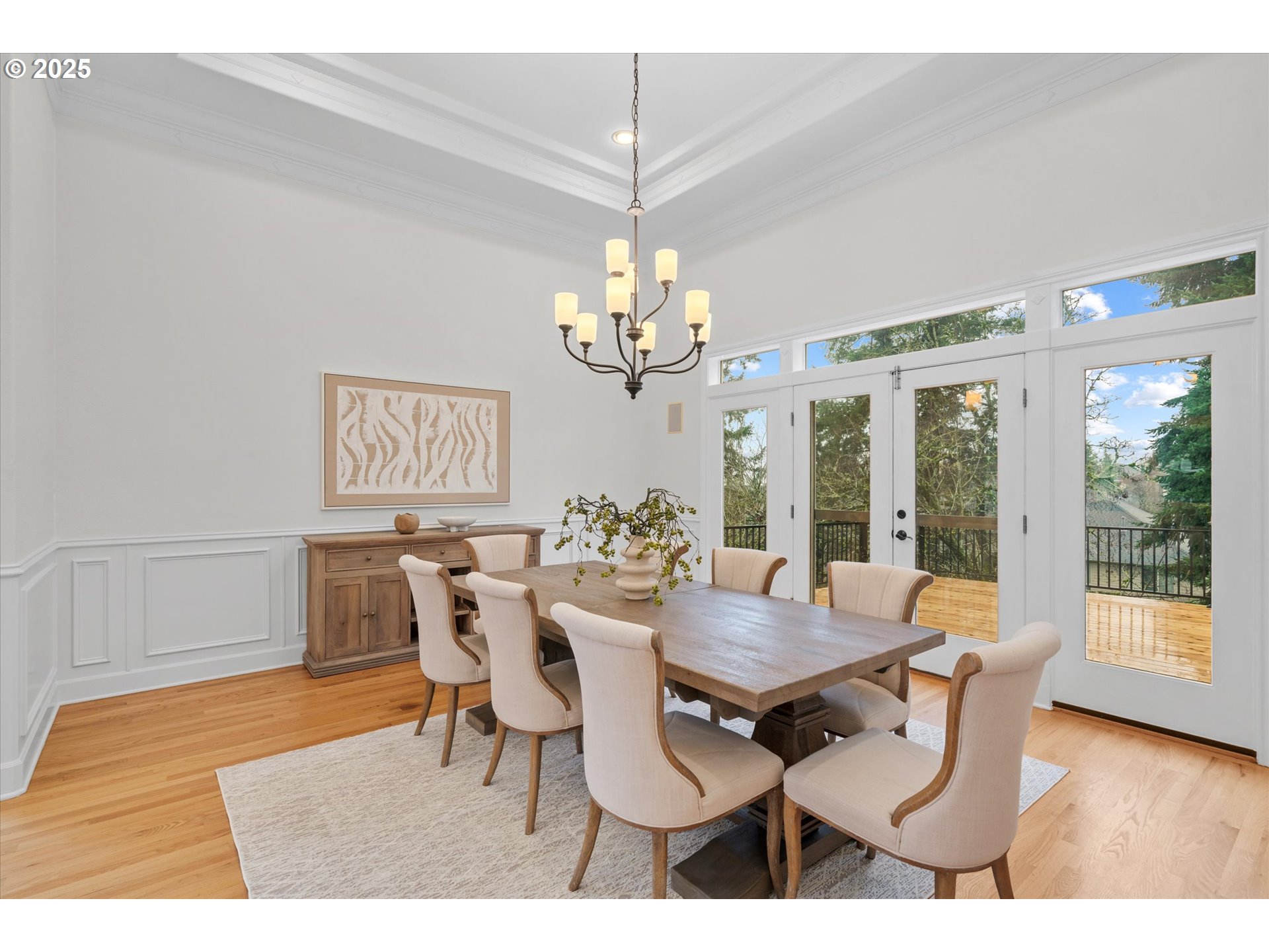 2711 Northwest 28th Circle Camas, WA 98607 - Photo 5 of 45 a view of a dining room with furniture wooden floor and chandelier