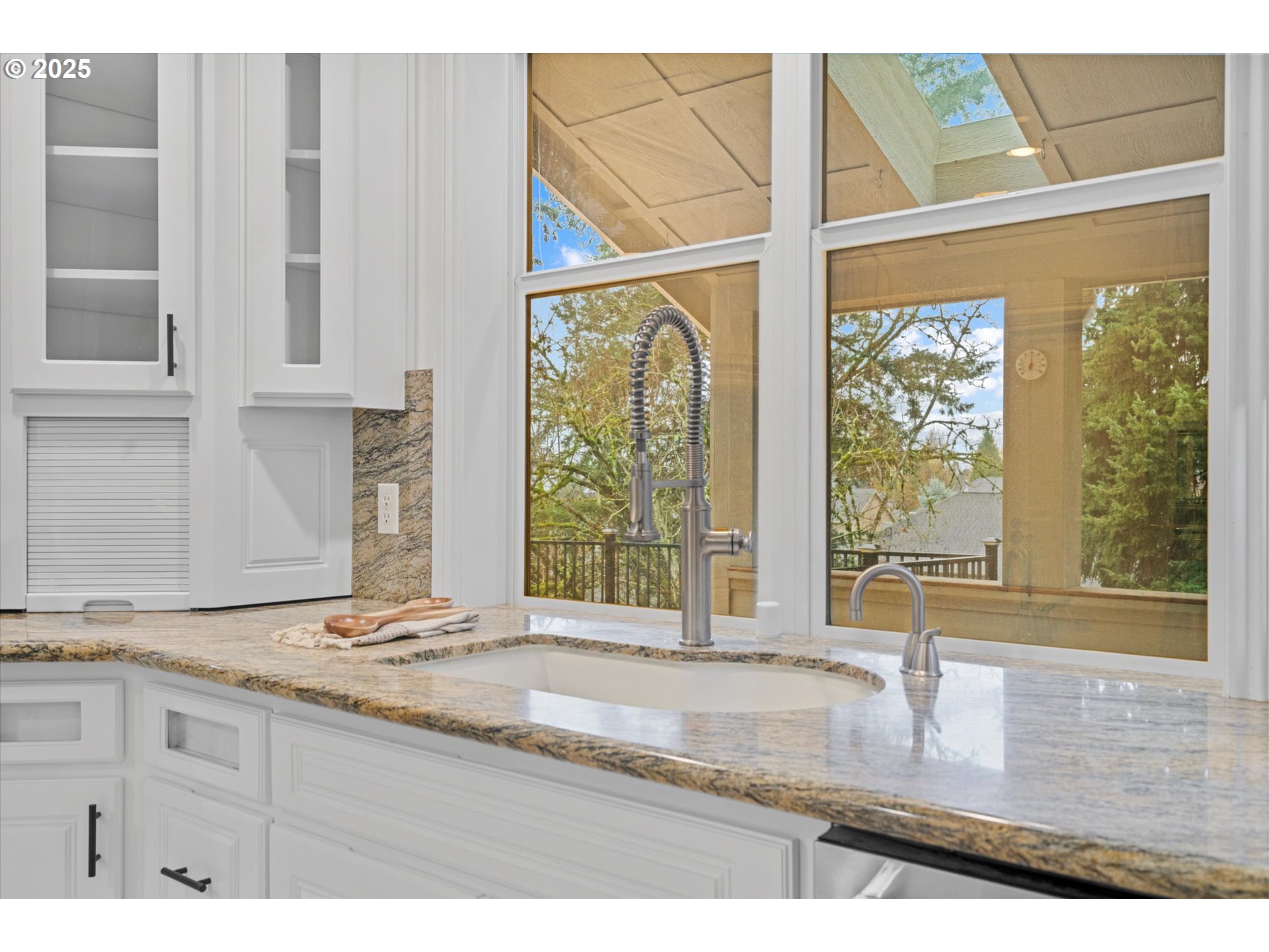 2711 Northwest 28th Circle Camas, WA 98607 - Photo 10 of 45 a view of a kitchen with granite countertop a sink and a window