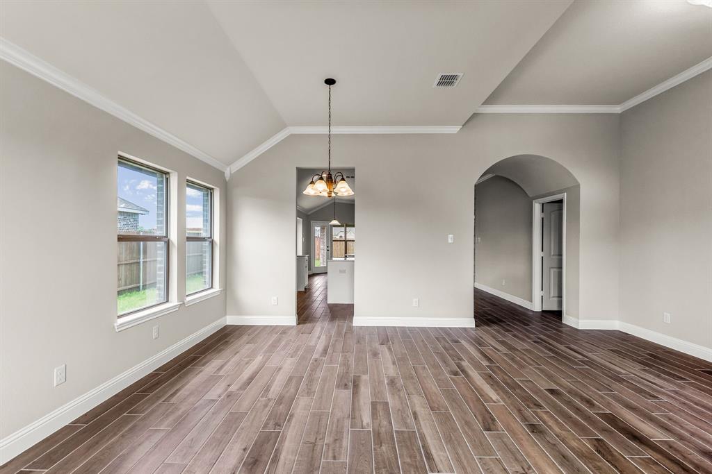 314 Pennington Road Josephine, TX 75173 - Photo 28 of 37 a view of empty room with wooden floor and fan