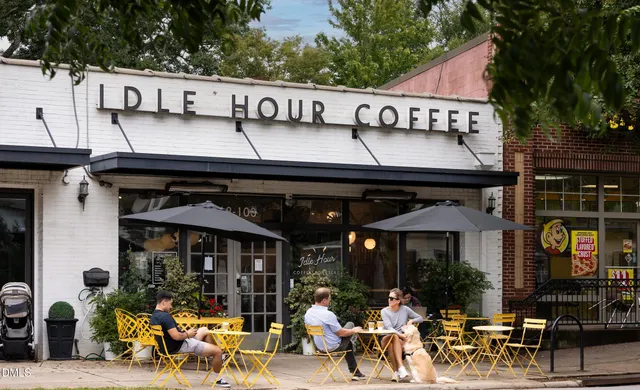 a view of a house with potted plants