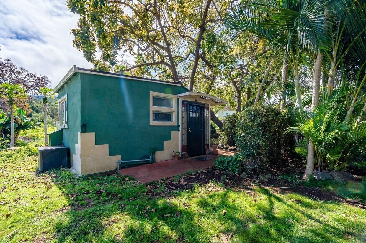 3135 Lower Kula Road Kula, HI 96790 - Photo 13 of 30 front view of a house with a yard