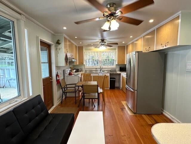 3135 Lower Kula Road Kula, HI 96790 - Photo 26 of 30 a view of a dining room with furniture window and wooden floor