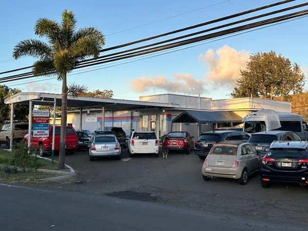 a car parked in front of a store
