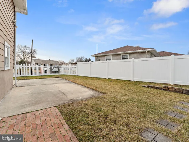 a view of swimming pool with an outdoor space and seating area