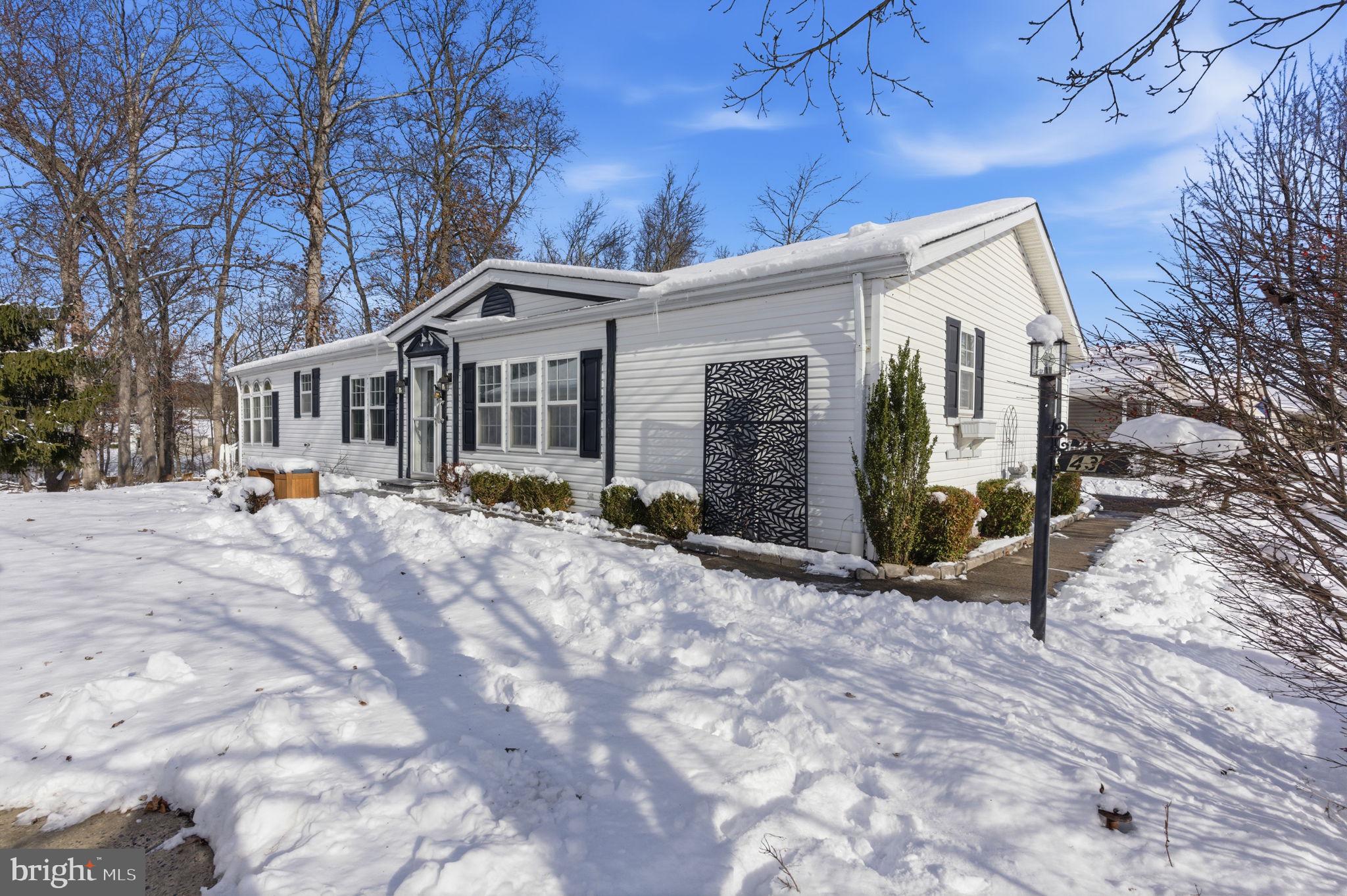 435 Spring Meadow Circle New Hope, PA 18938 - Photo 1 of 38 a front view of a house with a yard