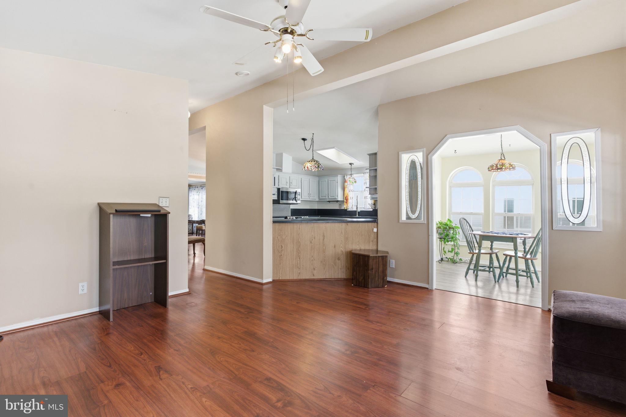 435 Spring Meadow Circle New Hope, PA 18938 - Photo 15 of 38 a view of a kitchen with furniture and wooden floor