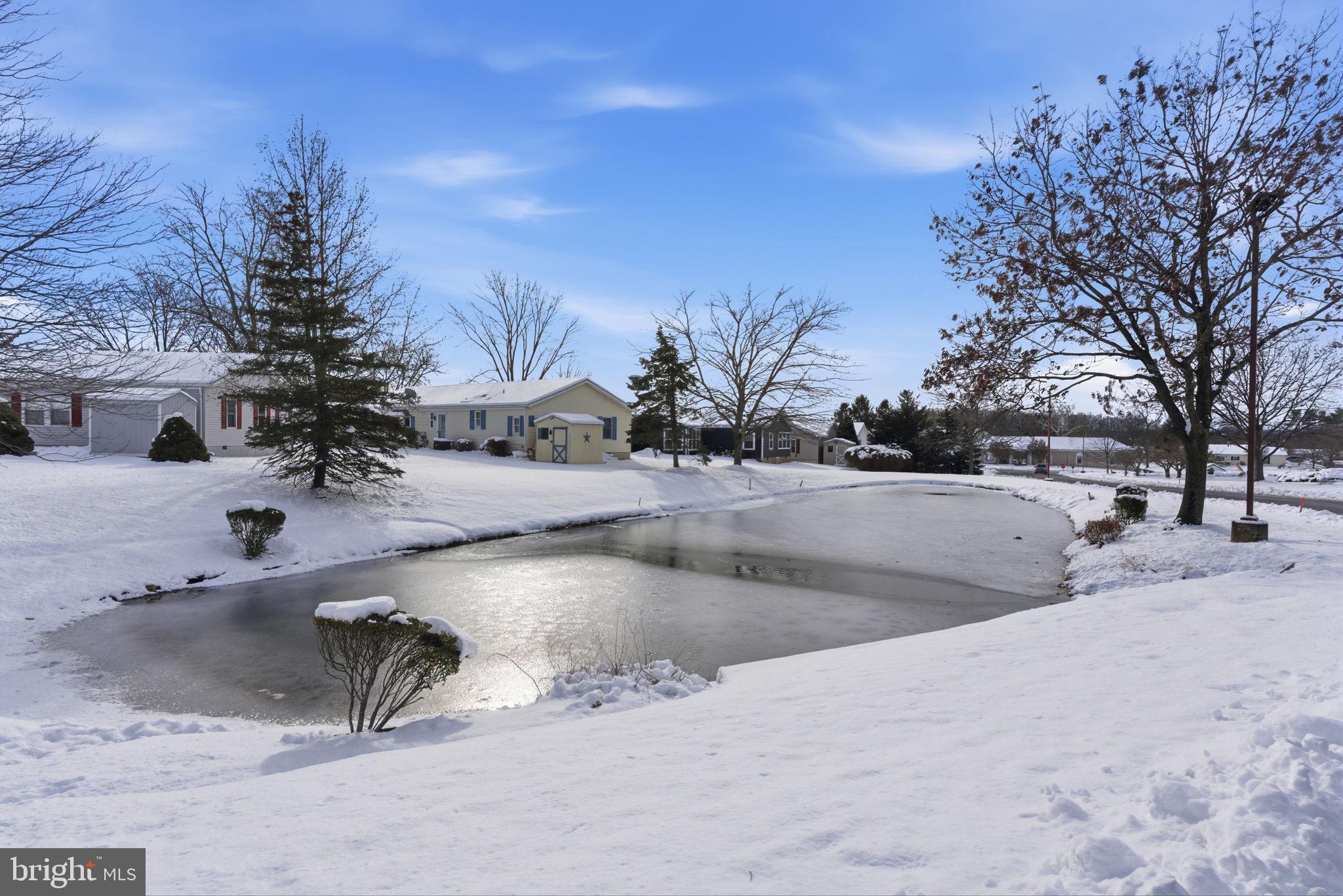435 Spring Meadow Circle New Hope, PA 18938 - Photo 36 of 38 a view of a swimming pool with a yard