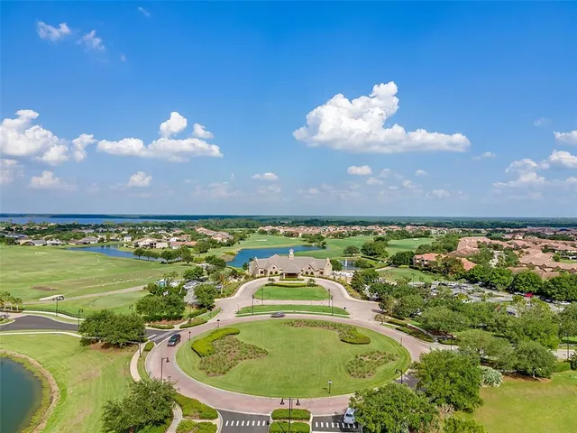 a view of a swimming pool with a table and chairs