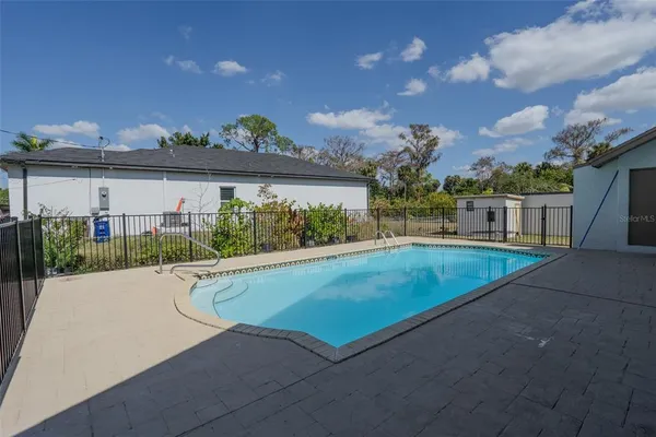 a view of outdoor space yard and swimming pool