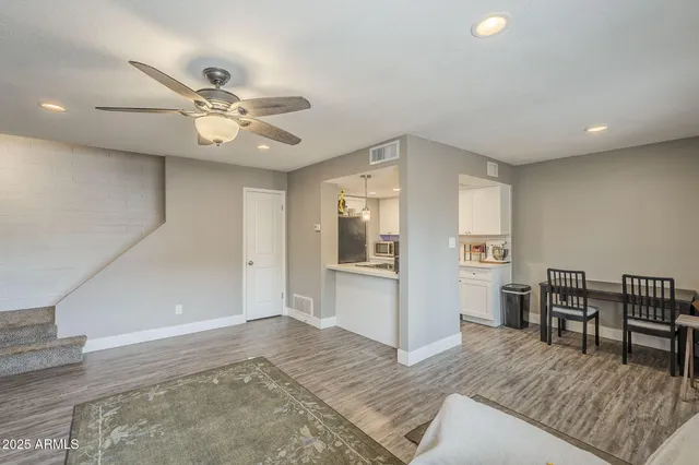 a kitchen with a sink stove and refrigerator