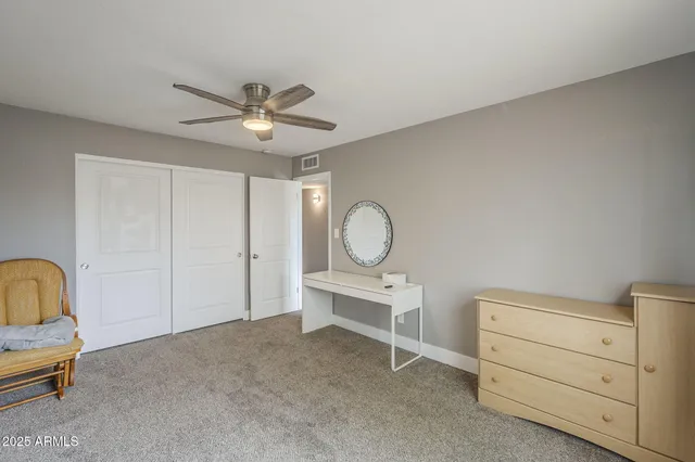 a bathroom with a shower and a toilet