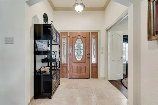 a big room with closet and wooden floor