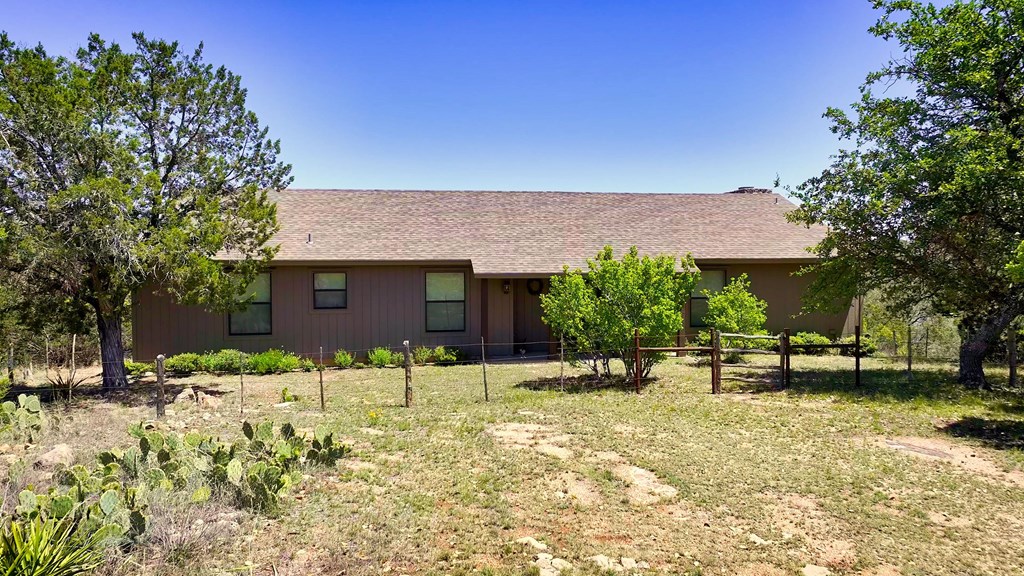 7461 Triplet Mill Road Mason, TX 76856 - Photo 26 of 46 a backyard of a house with table and chairs