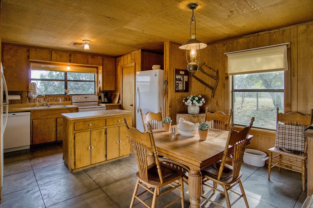 7461 Triplet Mill Road Mason, TX 76856 - Photo 30 of 46 a very nice looking kitchen with a large window appliances and cabinets